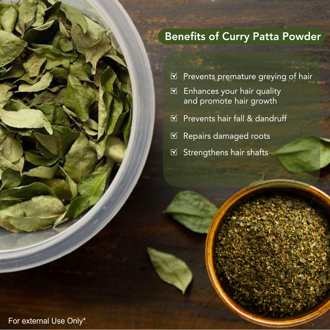 Applying Curry Patta Hair Pack paste to hair

