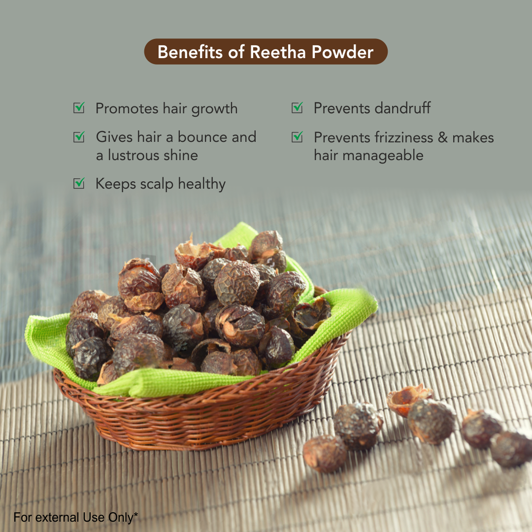 Applying Reetha Hair Pack paste to hair

